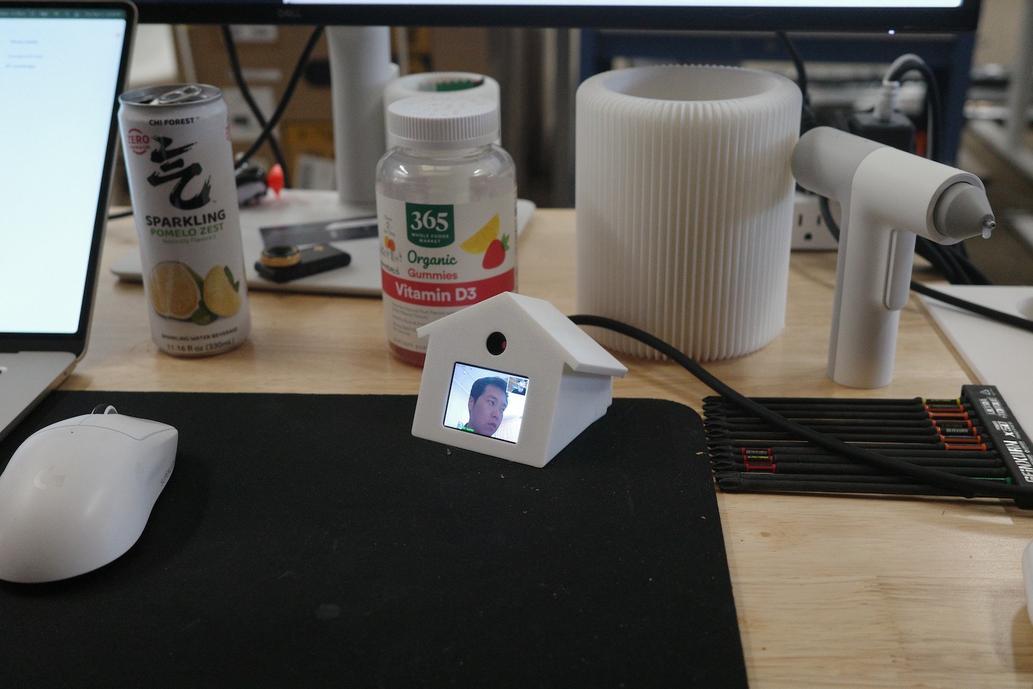 Birdhouse on a desk showing a loved one